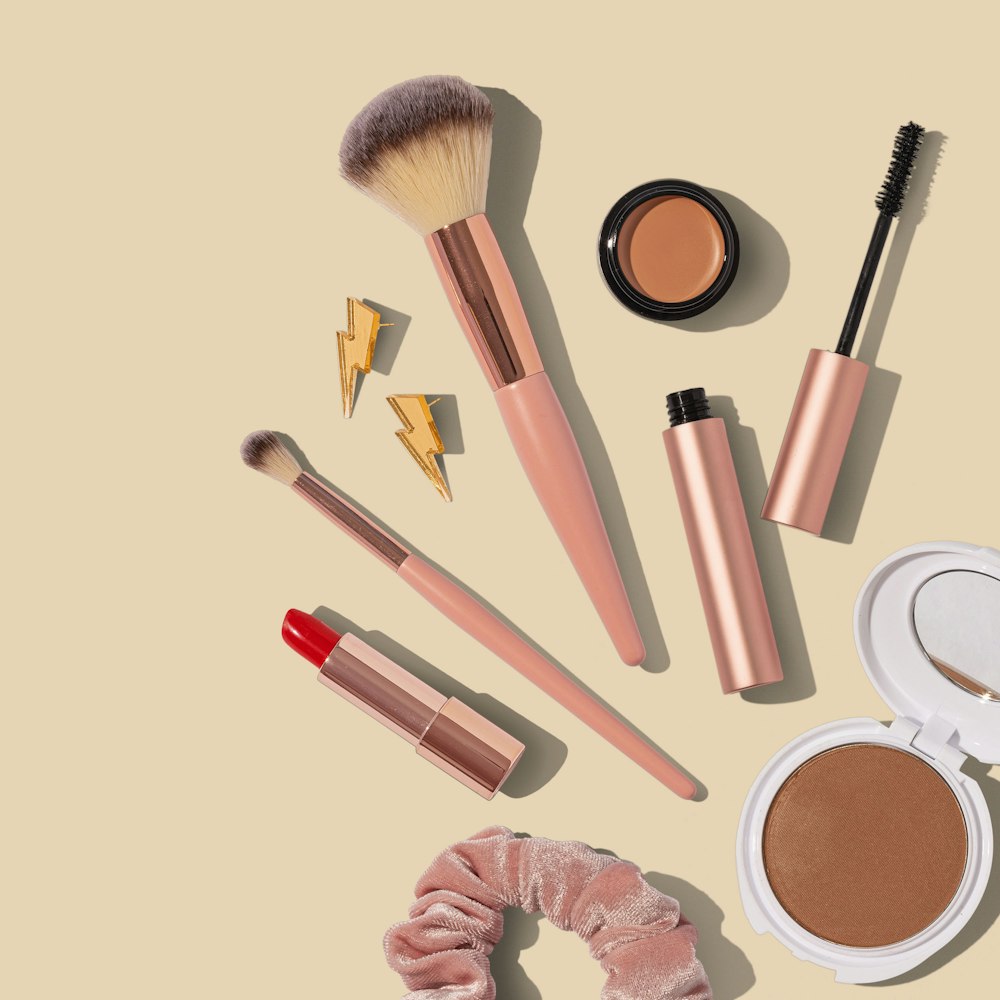 Curated luxury face makeup compacts and foundation bottles